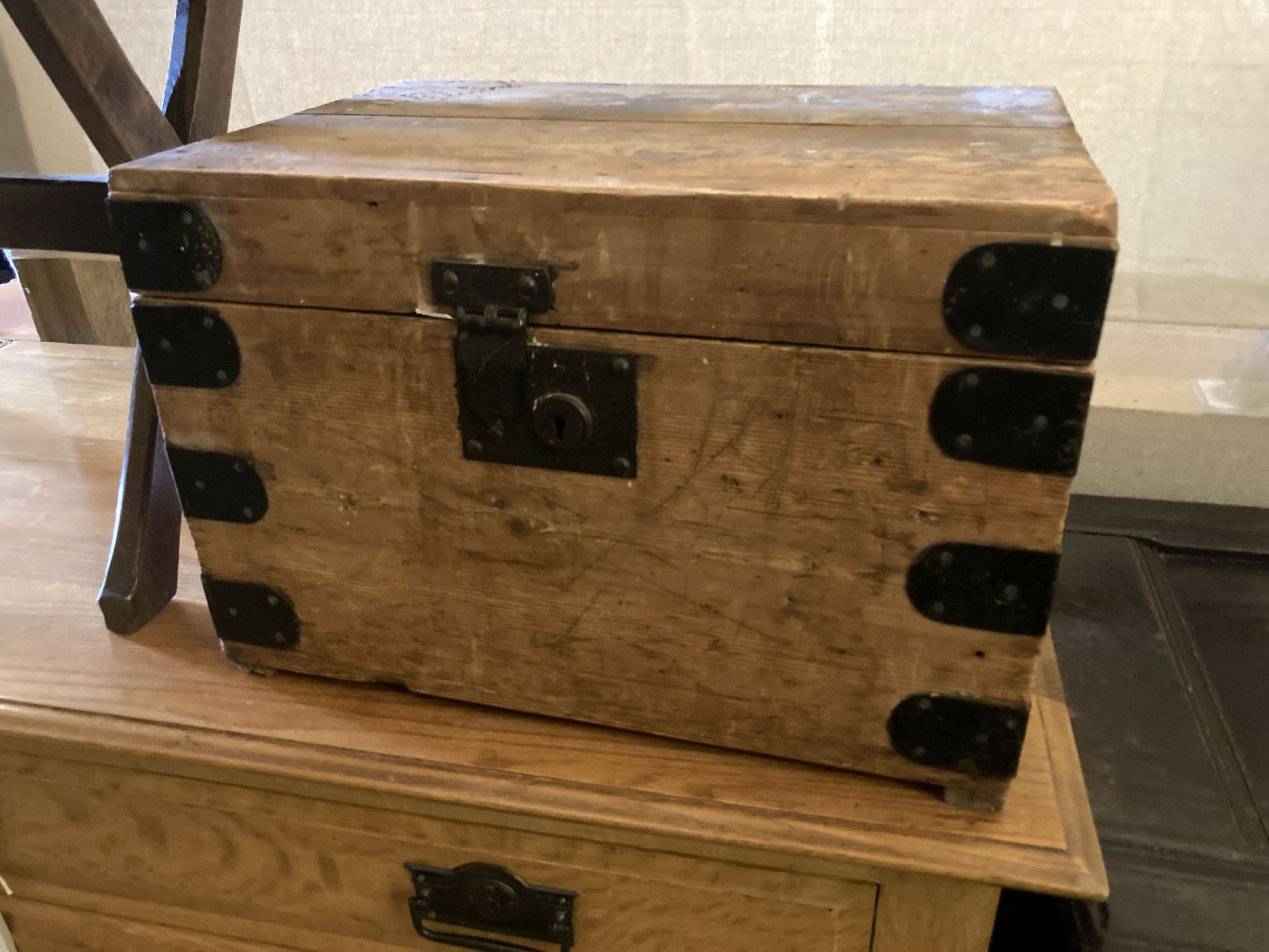 A rectangular oak X frame occasional table, width 61cm, depth 39cm, height 49cm together with a small Victorian iron bound pine trunk,